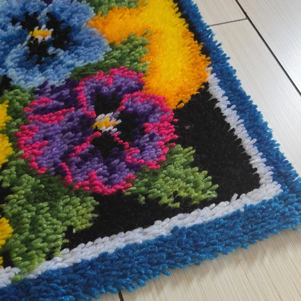 Completed Caron Wonderart Pot of Pansies Rug